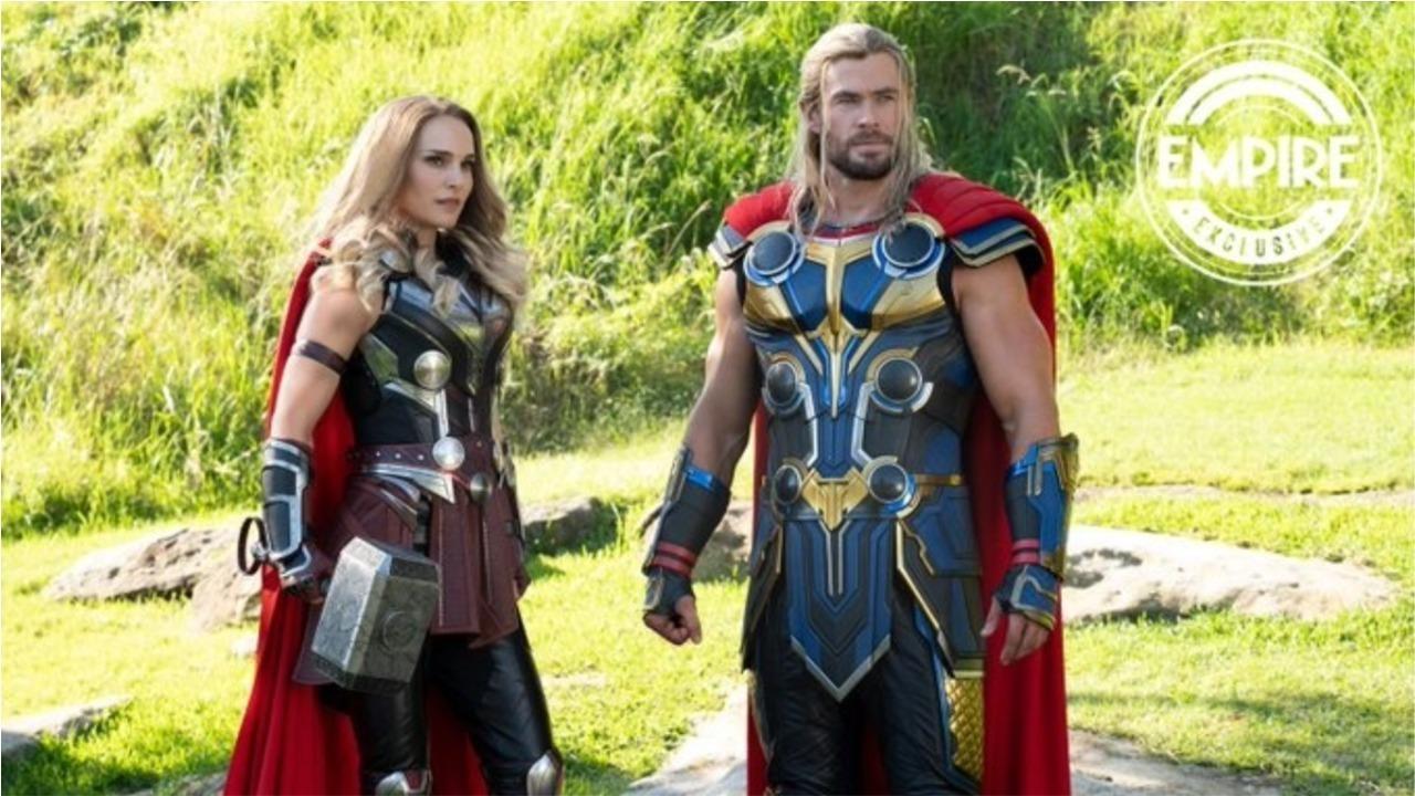 The two Thors played by Natalie Portman and Chris Hemsworth pose for Love & Thunder